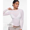 imageINLYRIC Womens Cosnufy Mesh Sheer Long Sleeve Tops See Through Crew Neck Going Out Tops Trendy Sexy ShirtsSnow White